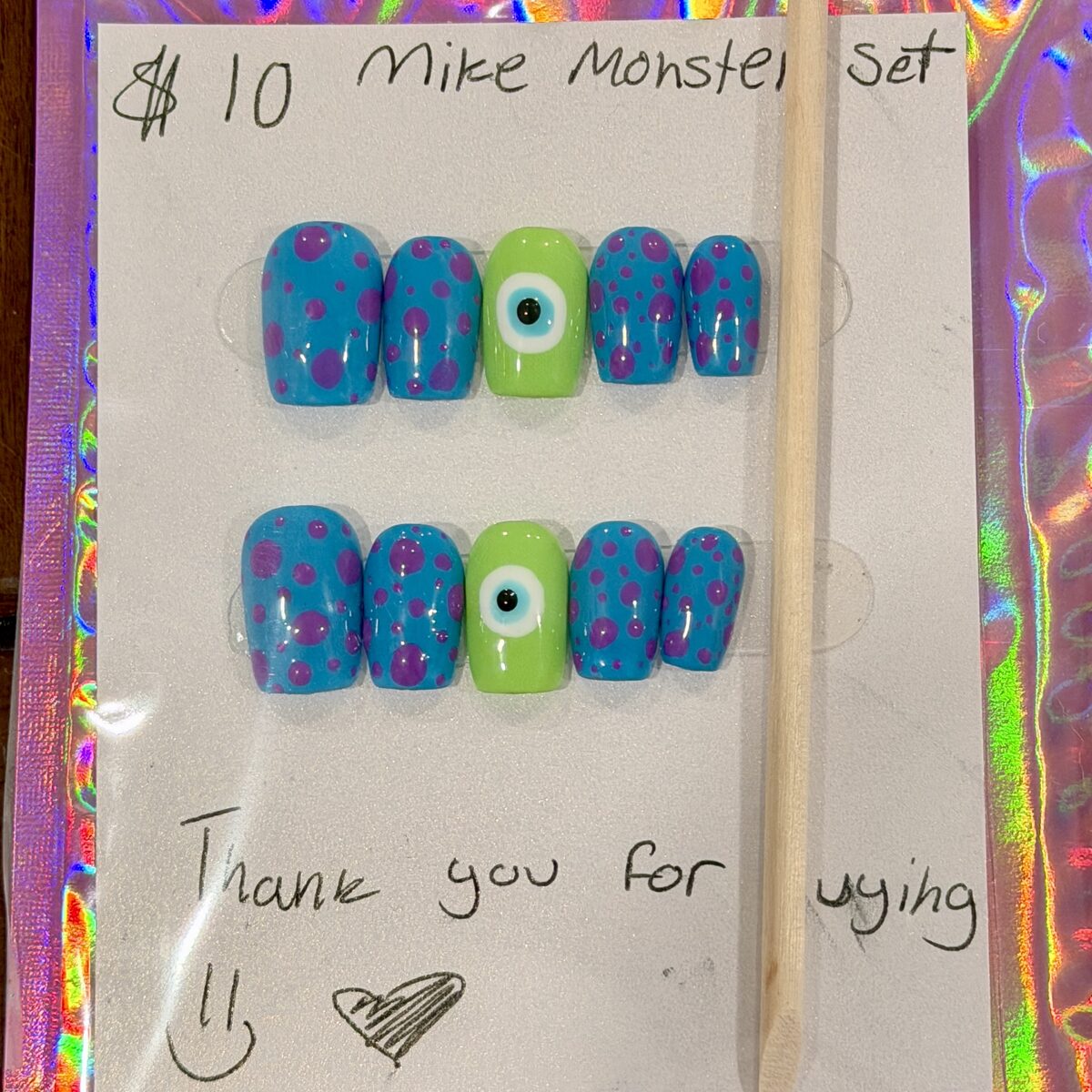 Mike Monster Set press-on nails with turquoise spots and green monster eyes